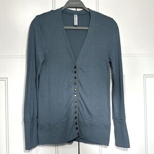 Zenana Outfitters  
* Baby blue long sleeve, half button cardigan